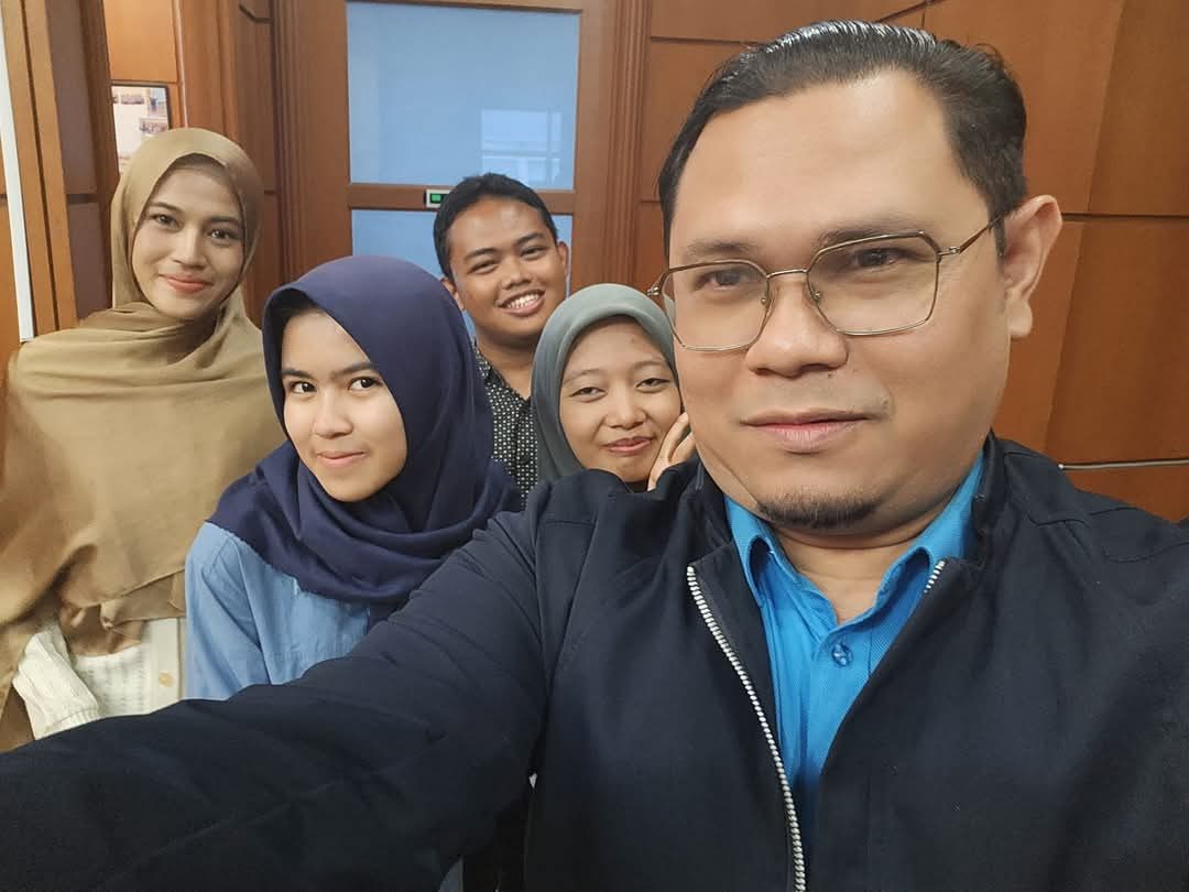 With postgraduate students, Shah Alam